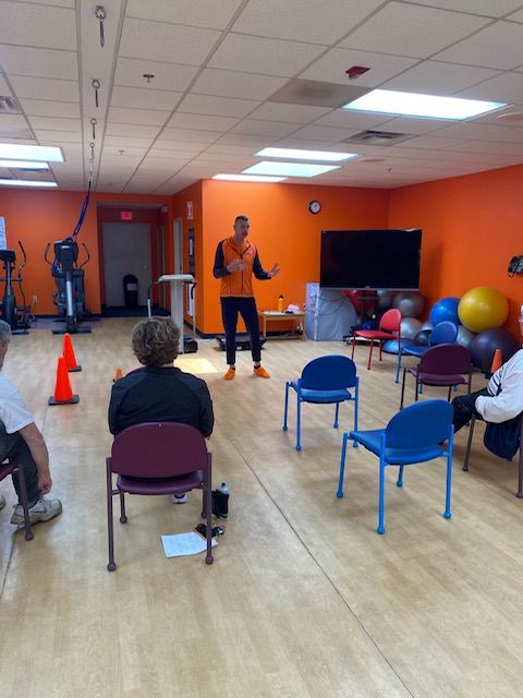 Mido leading a Parkinson's education workshop at Rochester School of Fitness