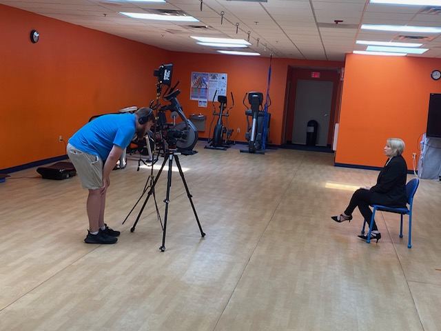 Television crew filming at Rochester School of Fitness — RSF has been featured in local media coverage